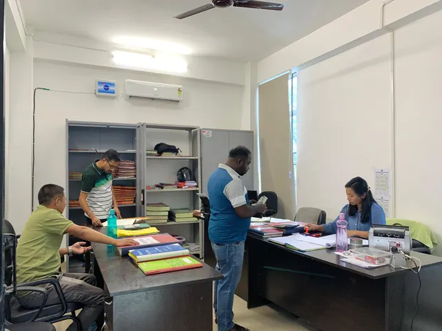 Staff at work in an office room of the council